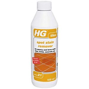 Tile stain remover for grease and oil stains on (floor)tiles HG spot stain remover (product 21) removes grease and oil from floor tiles, flagstones, natural stone, concrete and cement. With our tile stain remover, every tile is spotless again with a flick of the wrist.